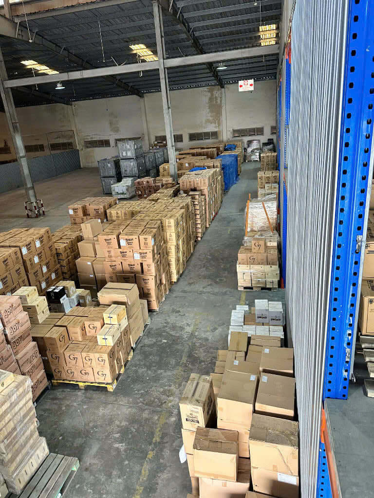 Security cameras monitoring a logistics warehouse
