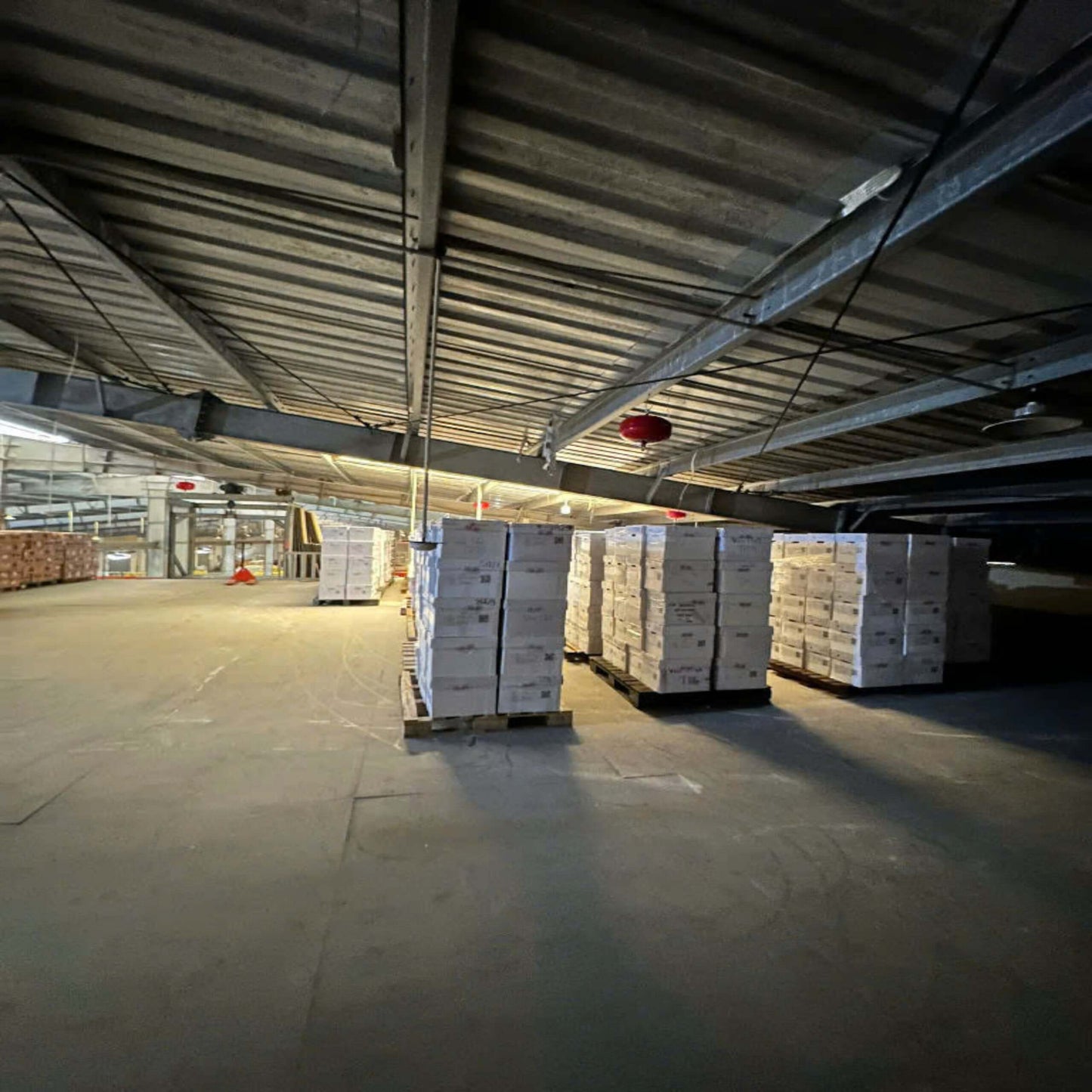 Warehouse staff organizing shipments in a secure but affordable facility